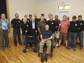 This photo provided by the office of former President George H.W. Bush, shows Bush posing with veterans during  the monthly pancake breakfast at the American Legion Post 159 in Kennebunkport, Maine, on Saturday, May 26, 2018. Bush arrived in Kennebunkport last week, about a month after the death of his wife of 73 years, Barbara. Bush has spent part of every summer in Kennebunkport since childhood with the exception of during his service as a naval aviator during World War II.   (Office of former President George H.W. Bush via AP)