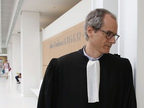 Benjamin Sarfati lawyer of American-born British screenwriter Terry Gilliam arrives at Paris' court house, Monday, May 7, 2018. This year's Cannes Film Festival is kicking off with a legal dispute, as a Paris court weighs whether the festival can legally show Monty Python star Terry Gilliam's long-awaited film "The Man Who Killed Don Quixote" or not. Portuguese producer Paulo Branco, who initially worked with Gilliam on the film, claims he has the rights to the movie and sued Cannes organizers to stop them from showing it. Gilliam, 77, contests Branco's claims.