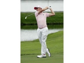 Justin Thomas hits from the ninth fairway, during the final round of The Players Championship golf tournament Sunday, May 13, 2018, in Ponte Vedra Beach, Fla.