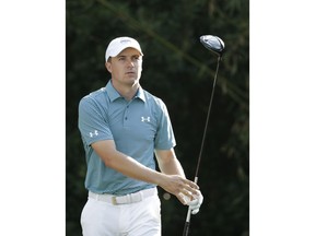 Jordan Spieth watches his shot from the 11th tee during the first round of The Players Championship golf tournament Thursday, May 10, 2018, in Ponte Vedra Beach, Fla.