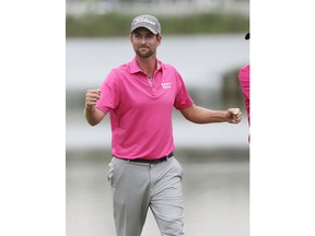 Webb Simpson celebrates winning The Players Championship golf tournament Sunday, May 13, 2018, in Ponte Vedra Beach, Fla.