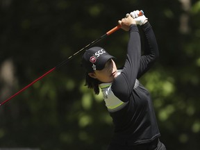 Moriya Jutanugarn, of Thailand, drives from the eighth tee during the first round of the LPGA Volvik Championship golf tournament at the Travis Pointe Country Club, Thursday, May 24, 2018, in Ann Arbor, Mich.
