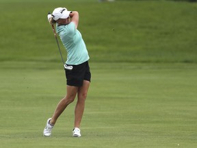 Stacy Lewis hits from the fairway on the first hole during the third round of the LPGA Volvik Championship golf tournament at the Travis Pointe Country Club Saturday, May 26, 2018, in Ann Arbor, Mich.