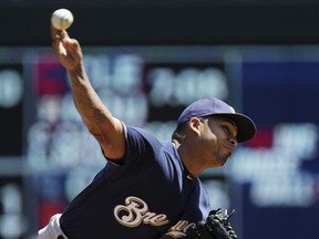 Milwaukee Brewers pitcher Junior Guerra (41) throws to the Minnesota Twins in the first inning of a baseball game Sunday, May 20, 2018 in Minneapolis.