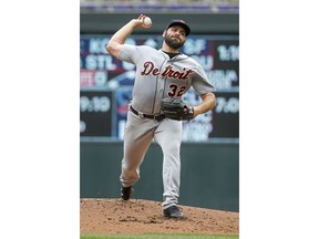 Detroit Tigers starting pitcher Michael Fulmer throws to the Minnesota Twins in the first inning of a baseball game Wednesday, May 23, 2018, in Minneapolis.