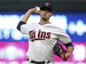 Minnesota Twins pitcher Jake Odorizzi throws against the Seattle Mariners in the first inning of a makeup baseball game Monday, May 14, 2018, in Minneapolis.