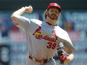 St. Louis Cardinals pitcher Miles Mikolas throws against the Minnesota Twins in the first inning of a baseball game Wednesday, May 16, 2018, in Minneapolis.