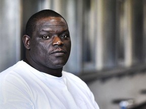 FILE - In this Sept. 2016 file photo, prisoner David Robinson poses for a portrait in the visiting area inside Jefferson City Correctional Center in Jefferson City, Mo. Missouri Attorney General Josh Hawley is recommending that charges be dismissed against Roberson, who has served nearly 20 years in prison for the death of a southeast Missouri woman. Hawley announced Monday, May, 14, 2018, that his office is recommending Robinson, be released from prison. Robinson has been in prison since 2001 for the killing of Sheila Box, who was shot to death after leaving a Sikeston bar.