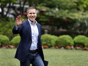 Missouri Gov. Eric Greitens waives to supporters as he walks to the podium to announce the release of funds for the state's biodiesel program Thursday, May 17, 2018, in Jefferson City, Mo.