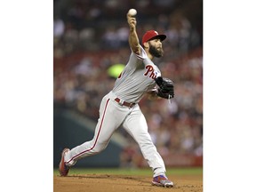 Philadelphia Phillies starter Jake Arrieta delivers a pitch during the first inning of the team's baseball game against the St. Louis Cardinals, Friday, May 18, 2018, in St. Louis.
