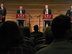 FILE - This March 22, 2018 file photo shows candidates for the Republican nomination to U.S. Senate, from left, Russell Fagg, Troy Downing, Matt Rosendale and Albert Olszewski listen to a question posed by a moderator belonging to the College Republicans at Montana State University in Bozeman, Mont. Outside money has poured into Montana's Republican U.S. Senate primary that will decide the challenger for Democratic incumbent Jon Tester.