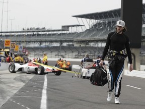 JR Hildenbrand walks down pit road before a practice session for the IndyCar Indianapolis 500 auto race at Indianapolis Motor Speedway in Indianapolis, Wednesday, May 16, 2018.