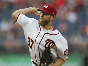 Washington Nationals starting pitcher Stephen Strasburg delivers a pitch to the Pittsburgh Pirates during the first inning of a baseball game at Nationals Park, Wednesday, May 2, 2018, in Washington.