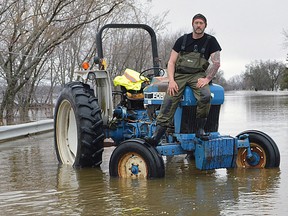 Markus Harvey poses for a photo in Maugerville, N.B. in this handout photo. Three New Brunswick men are behind bars after trying to loot a flooded home and flee in a canoe. Before dawn Sunday morning, Maugerville resident Harvey awoke to a loud thud and the beam of a flashlight coming up the stairs.
