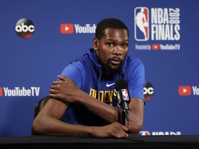 Kevin Durant answers questions Wednesday prior to Game 1 of the NBA Finals on Thursday in Oakland.