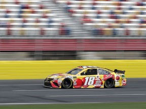 Kyle Busch drives his car during practice for Saturday's NASCAR All-Star auto race at Charlotte Motor Speedway in Concord, N.C., Saturday, May 19, 2018.