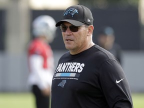 Carolina Panthers head coach Ron Rivera watches practice at the NFL football team's facility in Charlotte, N.C., Tuesday, May 22, 2018. While NFL owners are voting to approve the new Panthers owner in Atlanta, the team David Tepper is about to officially own takes to the field for the OTAs back in Charlotte with plenty of new faces.