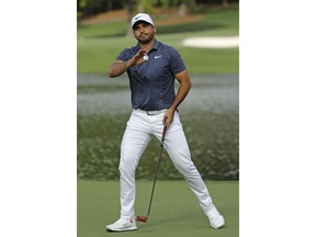 Jason Day celebrates after making a birdie putt on the 17th hole during the final round of the Wells Fargo Championship golf tournament at Quail Hollow Club in Charlotte, N.C., Sunday, May 6, 2018.