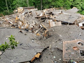 This photo provided by the Boone Police Department shows a home was destroyed by a gas leak following a landslide from the effects of Subtropical Storm Alberto on Wednesday, May 30, 2018 in Boone, N.C. Sgt. Shane Robbins said the landslide resulted in the "catastrophic destruction" of the home because of a gas leak. (Boone Police Department via AP)