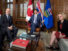 Forced smiles can’t hide the tension as John Horgan and Rachel Notley meet with Prime Minister Justin Trudeau in April to try to work out a solution to the Trans Mountain pipeline impasse.