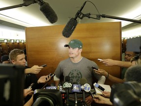 New York Jets quarterback Christian Hackenberg talks to reporters after a practice at the NFL football team's training camp in Florham Park, N.J., Tuesday, May 22, 2018.