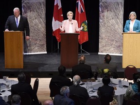 Ontario Progressive Conservative Leader Doug Ford, left to right, Ontario Liberal Leader Kathleen Wynne and Ontario NDP Leader Andrea Horwath take part in the second of three leaders' debate in Parry Sound, Ont., on Friday, May 11, 2018.