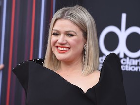 Kelly Clarkson arrives at the Billboard Music Awards at the MGM Grand Garden Arena on Sunday, May 20, 2018, in Las Vegas.