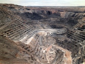 FILE - This undated file photo shows Barrick Goldstrike Mines' Betze-Post open pit near Carlin, Nev. Environmental groups challenged the Trump administration in federal court Wednesday, May 16, 2018, over its rejection of an Obama-era proposal that would have required mining companies to prove they have enough money to clean up their pollution.