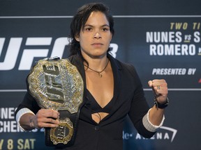 FILE - In this July 6, 2017, file photo, Amanda Nunes poses during media day for UFC 213 in Las Vegas. Nunes will defend her UFC bantamweight title for the third time on Saturday as a heavy favorite against American Raquel Pennington.