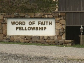 FILE - This 2016 image from video shows the entrance to the Word of Faith Fellowship church in Spindale, N.C. A father and son who belong to the secretive evangelical church in North Carolina pleaded guilty Friday, May 25, 2018,  to federal criminal charges in an unemployment benefits scheme that former congregants have said was part of a plan to keep money flowing into the church. As part of an ongoing investigation into physical and emotional abuse at the Word of Faith Fellowship Church. The Associated Press reported in September that authorities were looking into the unemployment dealings of congregants and their businesses.