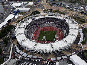 FILE - This Aug. 3, 2012, aerial file photo shows the Olympic Stadium at Olympic Park, in London. A person familiar with the planning tells The Associated Press that Major League Baseball intends to announce next week plans have been finalized to have the New York Yankees and Boston Red Sox play a two-game series at London's Olympic Stadium on June 29-30 next year. The person spoke on condition of anonymity Thursday, May 3, 2018, because no public comments were authorized. These will be the first regular-season MLB games in Europe. The Red Sox will be the home team for the both games.