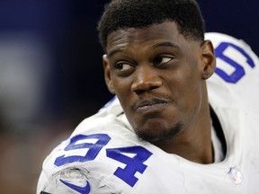 FILE - In this Dec. 26, 2016, file photo, Dallas Cowboys' Randy Gregory stands on the sideline late in the second half of an NFL football game against the Detroit Lions in Arlington, Texas. A person with direct knowledge of the application said Friday, May 18, 2018, that Gregory is set to seek reinstatement after missing the 2017 season over multiple violations of the NFL's substance-abuse policy.