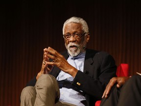 FILE - In this April 9, 2014, file photo, Basketball Hall of Famer Bill Russell takes part in the "Sports and Race: Leveling the Playing Field" panel during the Civil Rights Summit in Austin, Texas. Russell has been released from a Seattle hospital after an overnight stay for an unknown condition. Russell confirmed on Twitter Saturday, May 19, 2018,  that he went to the hospital late Friday but does not say why.