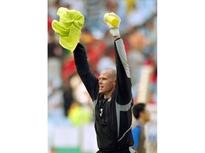 FILE - In this June 17, 2002, file photo, U.S. soccer team goalkeeper Brad Friedel celebrates the 2-0 victory over Mexico in their 2002 World Cup second round playoff soccer game at Jeonju World Cup Stadium in Jeonju, South Korea. Former U.S. goalkeeper Brad Friedel was surprised with the announcement of his National Soccer Hall of Fame induction, Thursday, May 31, 2018.