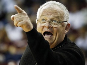 FILE - In this March 18, 2016, file photo, Chattanooga head coach Jim Foster yells during a first-round women's college basketball game against Mississippi State in the NCAA Tournament in Starkville, Miss. Chattanooga's Jim Foster is retiring after a four-decade career in which he won more than 900 games. He's the only women's basketball coach to earn NCAA Tournament bids with four different schools. The school said in a statement Tuesday, May 8, 2018, the 69-year-old coach wanted to spend more time with his family.