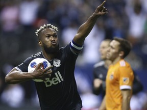 FILE - In this Friday, May 11, 2018, file photo, Vancouver Whitecaps defender Kendall Waston celebrates his goal against the Houston Dynamo during the second half of an MLS soccer match in Vancouver, British Columbia. Waston was selected for Cost Rica's 23-man roster for the World Cup in Russia.