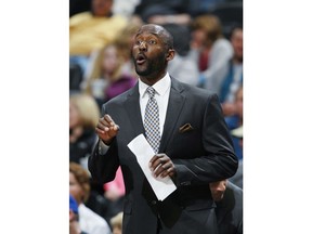 FILE - In this Jan. 1, 2014, file photo, Philadelphia 76ers assistant coach Lloyd Pierce talks to players during the team's NBA basketball game against the Denver Nuggets in Denver. The Atlanta Hawks are giving Pierce his first head coaching job in the NBA, choosing a man who has been an assistant with Philadelphia and Memphis to rebuild the franchise. The Hawks announced Friday, May 11, 2018. they had agreed to terms on a deal with Pierce.