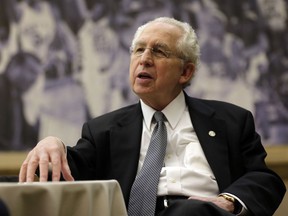FILE - In this Oct. 25, 2012, file photo, Southeastern Conference Commissioner Mike Slive talks with reporters during the SEC basketball media day in Hoover, Ala. Slive, the former SEC commissioner who guided the league through a period of unprecedented success and prosperity, died Wednesday, May 16, 2018. He was 77. The Southeastern Conference said Slive died in Birmingham, Ala., where he lived with his wife of 49 years, Liz. The conference didn't provide the cause of death. Slive retired in 2015 after 13 years as commissioner. He was battling prostate cancer at the time he stepped down.