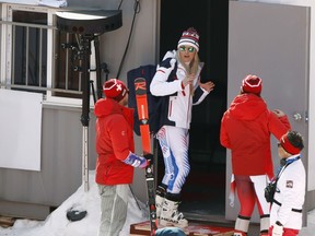 FILE - In this Feb. 21, 2018, file photo, United States' Lindsey Vonn heads into the doping control room after competing in women's downhill at the Winter Olympics in Jeongseon, South Korea. Questions over the integrity of sample-collection bottles led to frustration from athletes at this year's Winter Olympics, including two who tightened their bottles so tightly, they cracked the caps. In all, there were 3,189 tests conducted.