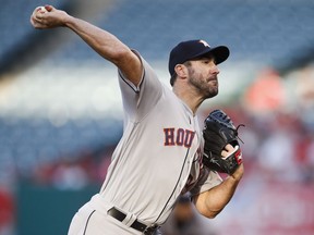 FILE - In this May 16, 2018, file photo, Houston Astros starting pitcher Justin Verlander throws to a Los Angeles Angels batter during the first inning of a baseball game in Anaheim, Calif. Verlander and the Astros play the San Francisco Giants on Wednesday.