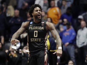 FILE - In this March 18, 2018, file photo, Florida State forward Phil Cofer (0) celebrates after defeating Xavier in a second-round game in the NCAA college basketball tournament in Nashville, Tenn. Cofer, who helped lead the Seminoles to the Elite Eight last season, has been granted a fifth season of eligibility by the NCAA.