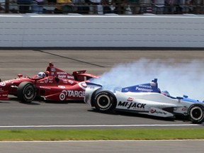 FILE - In this May 27, 2012, file photo, Takuma Sato, right, of Japan, spins in the first turn under Dario Franchitti, of Scotland, on the final lap of IndyCar's Indianapolis 500 auto race at Indianapolis Motor Speedway in Indianapolis. Coming close in a potentially life-changing race doesn't really matter. It's how these drivers handle the situation when they return to Indy.
