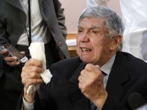 FILE - In this April 13, 2011, file photo, anti-Castro activist Luis Posada Carriles gestures as he responds to a reporter during a news conference in Miami. A lawyer for him said the militant Cuban exile has died Wednesday, May 23, 2018, at a South Florida care home for elderly veterans. He was 90.