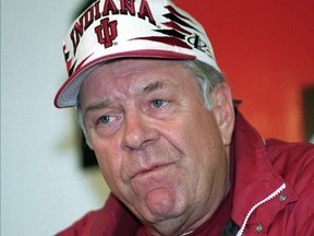 FILE - In this Oct. 31, 1996, file photo, Indiana University football coach Bill Mallory speaks at a news conference in Bloomington, Ind., after he was fired. Mallory, the winningest football coach in Indiana history who also led three other schools to bowl games, has died from a brain injury suffered in a recent fall. He was 83.