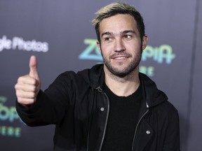 FILE - In this Feb. 17, 2016, file photo, Pete Wentz attends the LA Premiere of "Zootopia" held at El Capitan Theatre in Los Angeles. Wentz took to Instagram on Sunday, May 13, 2018, to announce the birth of his daughter with partner Meagan Camper. He wrote he's grateful Marvel Jane Wentz is here and she's "ready to takeover the world."