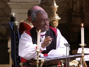 In this frame from video, the Most Rev. Michael Bruce Curry speaks during the wedding ceremony of Britain's Prince Harry and Meghan Markle at St. George's Chapel in Windsor Castle in Windsor, near London, England, Saturday, May 19, 2018.  (UK Pool/Sky News via AP)