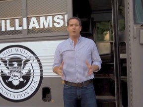 In this frame from video provided by the Michael Williams for Governor campaign, Williams shows off his "Deportation Bus" in an advertisement. News outlets report Williams will bring the bus to what his campaign calls Georgia's "dangerous sanctuary cities" beginning Wednesday, May 16, 2018. (Michael Williams for Governor via AP)