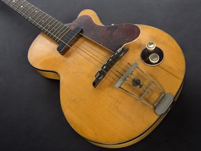 This image provided by Julien's Auctions shows George Harrison's first electric guitar. The auction house estimates the guitar will sell for between $200,000 and $300,000. (Julien's Auctions via AP)