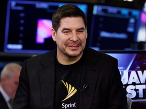 FILE - In this Monday, April 30, 2018, file photo, Sprint CEO Marcelo Claure is interviewed on the floor of the New York Stock Exchange. Sprint, in the midst of an attempted $26.5 billion merger with T-Mobile, is shuffling some of its top executives. CEO Marcelo Claure will become executive chairman of the wireless carrier, with Chief Financial Officer Michel Combes succeeding Claure in the top post.