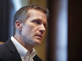 FILE - In this Jan. 20, 2018, file photo, Missouri Gov. Eric Greitens listens to a question during an interview in his office at the Capitol in Jefferson City, Mo., where discussed having an extramarital affair before taking office. Jury selection is taking longer than expected in the criminal trial of Greitens. Opening arguments had been expected to begin Monday, May 14. Instead, attorneys who began screening prospective jurors last week are to continuing doing so Monday.